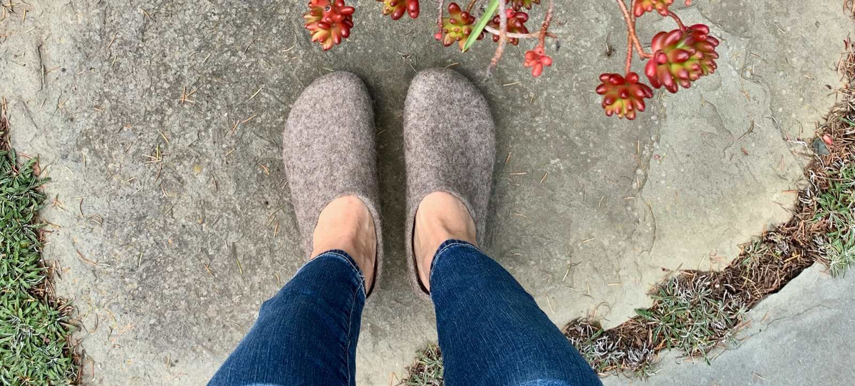 A Stegmann ambassador showing off her comfy grey wool clogs.