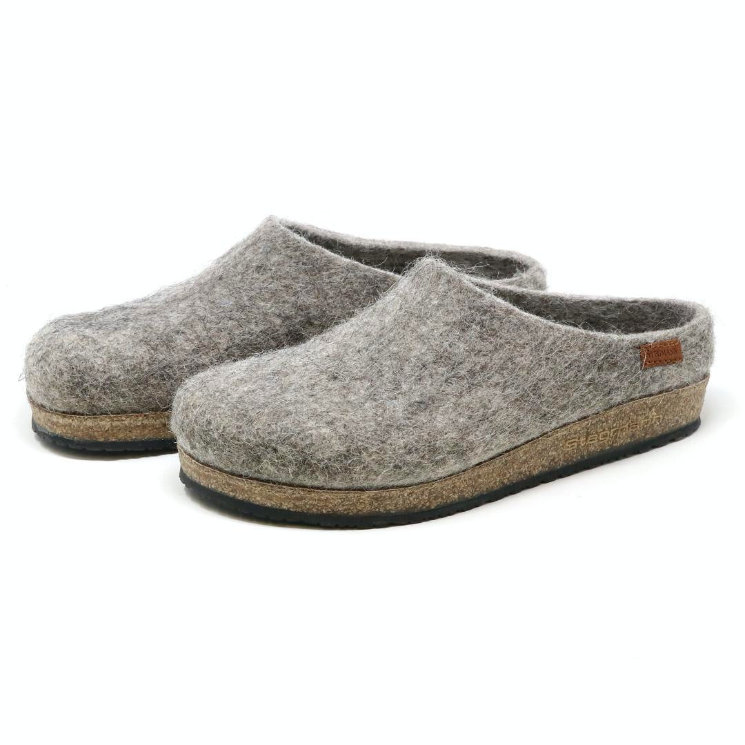 Women's Eco Wool Clog: gray wool felt clogs with a supportive cork latex footbed and black rubber outsoles, sustainably crafted from wool and shown on a white background.