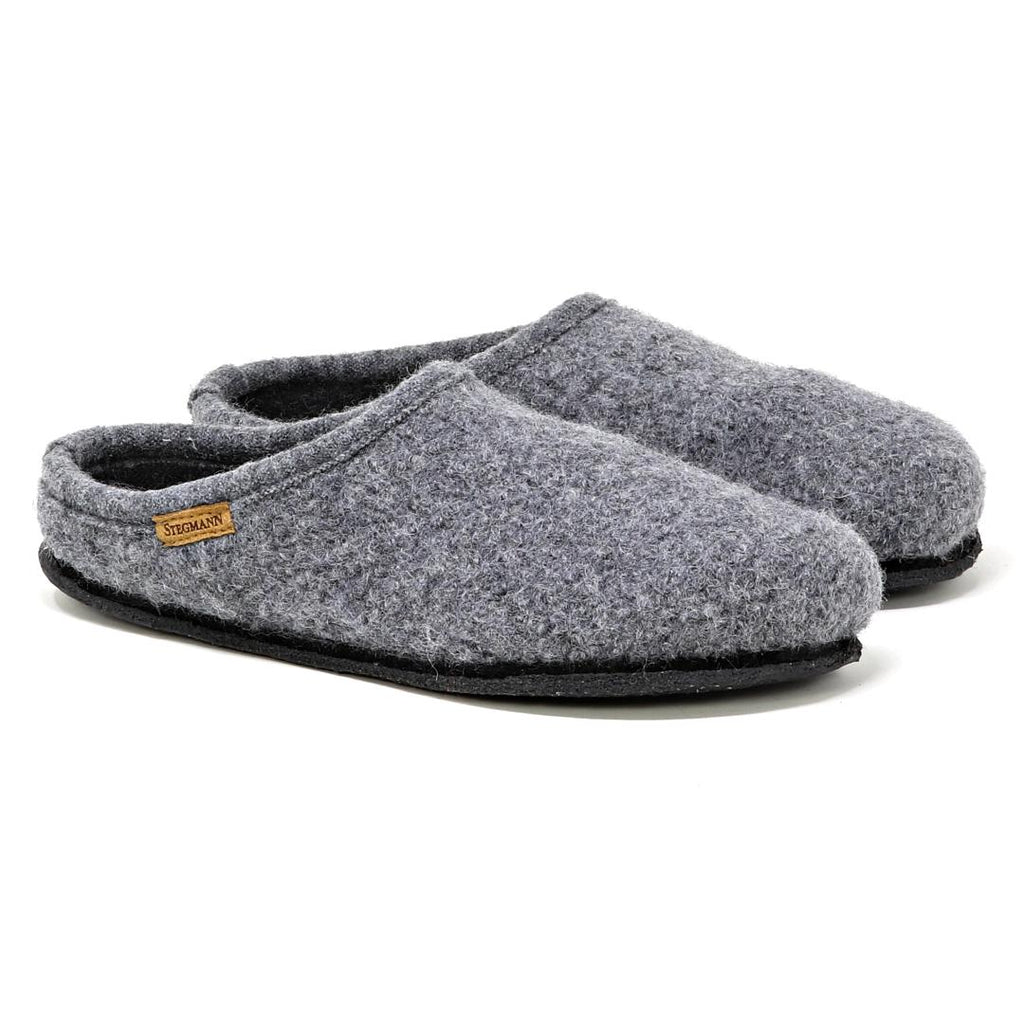 Women's Alpine Comfort Wool Slippers in gray feature a cork insole, black sole, and a small brown side tag.
