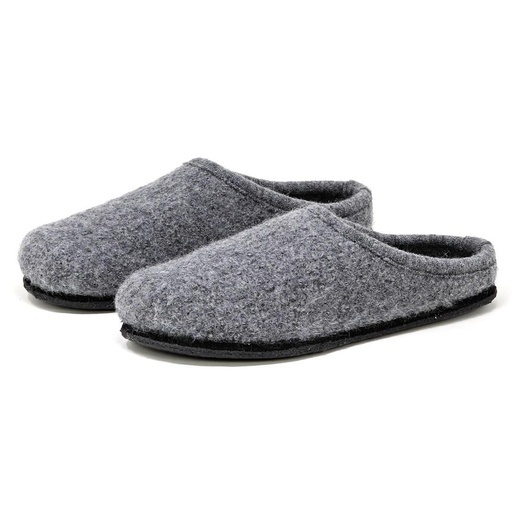 The Men's Alpine Comfort Wool Slipper features gray Merino wool uppers, black rubber soles, and anatomically shaped cork insoles for optimal comfort.
