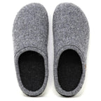 The Men's Alpine Comfort Wool Slipper in gray has black interiors, an anatomically shaped cork insole for comfort, and is shown from above.