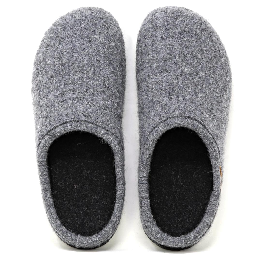 The Men's Alpine Comfort Wool Slipper in gray has black interiors, an anatomically shaped cork insole for comfort, and is shown from above.