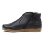 The Women's Leather Amalia Boot, shown in profile against a white background, features black leather, a side zipper, and a brown cork-textured sole.