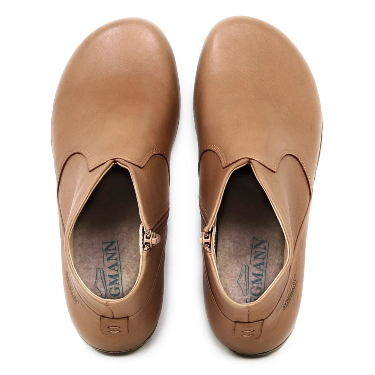 A pair of tan Women's Leather Amalia Boots viewed from above, showing the insoles with the "Sagmann" brand logo.