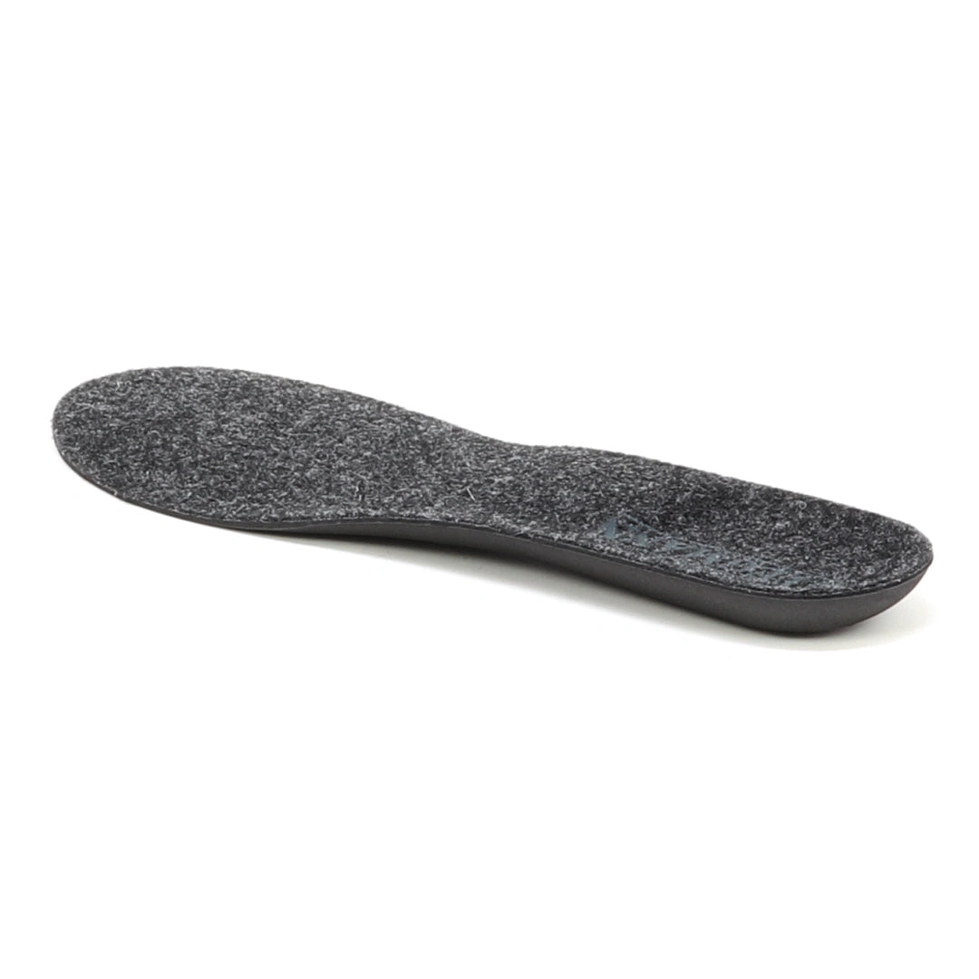 A single Women's Wool Contour Replacement Insole w/Arch in black is displayed on a white background, featuring a textured fabric upper layer and a contoured design for enhanced arch support.