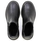 Top view of a pair of Women’s Brenner Chelsea Boots in black leather with rounded toes and elastic side panels, placed on a white background—these lightweight boots offer comfort and versatility for any occasion.