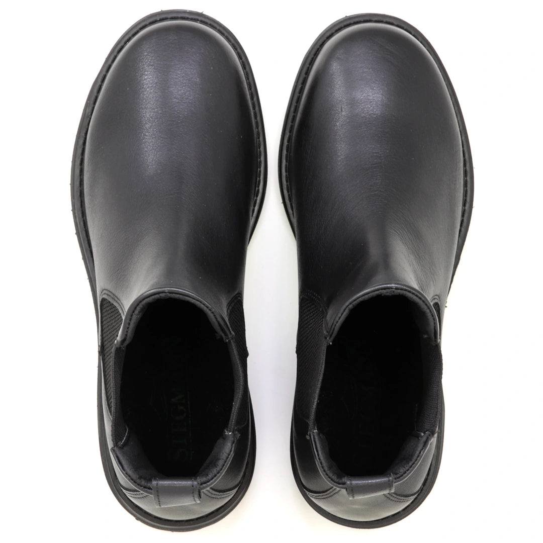 Top view of a pair of Women’s Brenner Chelsea Boots in black leather with rounded toes and elastic side panels, placed on a white background—these lightweight boots offer comfort and versatility for any occasion.