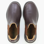 A pair of Women’s Brenner Chelsea Boots in brown lightweight leather are shown from above on a white background.