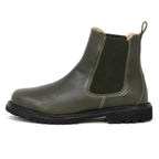 The Women’s Brenner Chelsea Boot is shown in profile on a white background—a single olive green waterproof Chelsea boot featuring a black elastic side panel, back pull tab, and a black lug sole, crafted from premium Portuguese leather.
