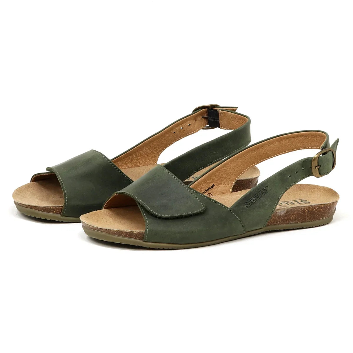 The Women's Clara Slingback Sandal features green open-toe design, a cork-style sole, and a slingback strap with a buckle closure. It offers support with comfort features like a cushioned footbed for all-day ease.