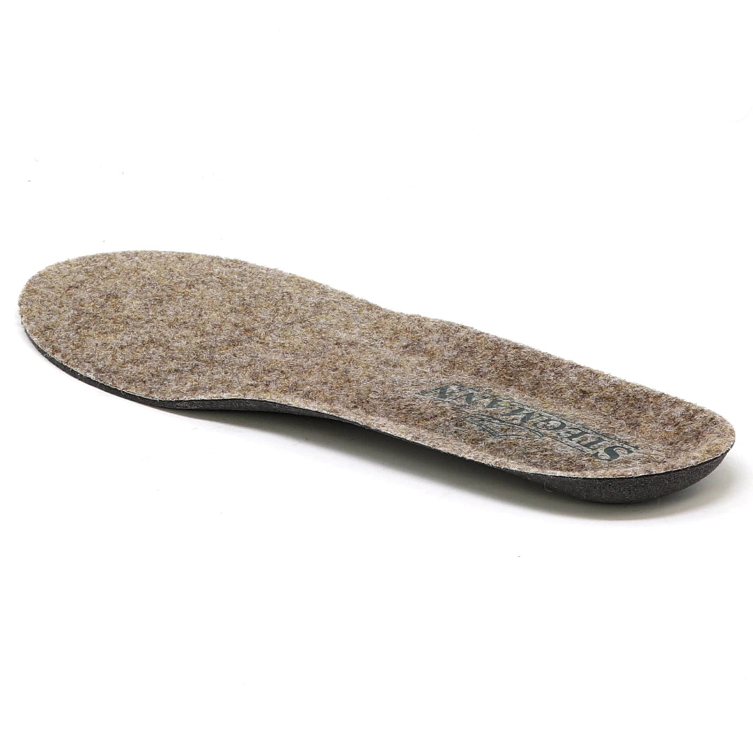 Women’s Wool Cushion Replacement Insoles - No Arch in brown felt, featuring “SUPERMAN” printed in faded text and designed for Stegmann shoes, are shown on a white background at a slight side angle. These wool insoles provide gentle comfort and enhanced support for daily use.