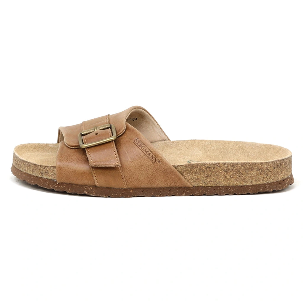 The Women's Ella Slide Sandal features a brown leather upper, a single wide strap with a metal buckle, and a contoured cork footbed—evoking the classic style of the Birkenstock Gizeh.