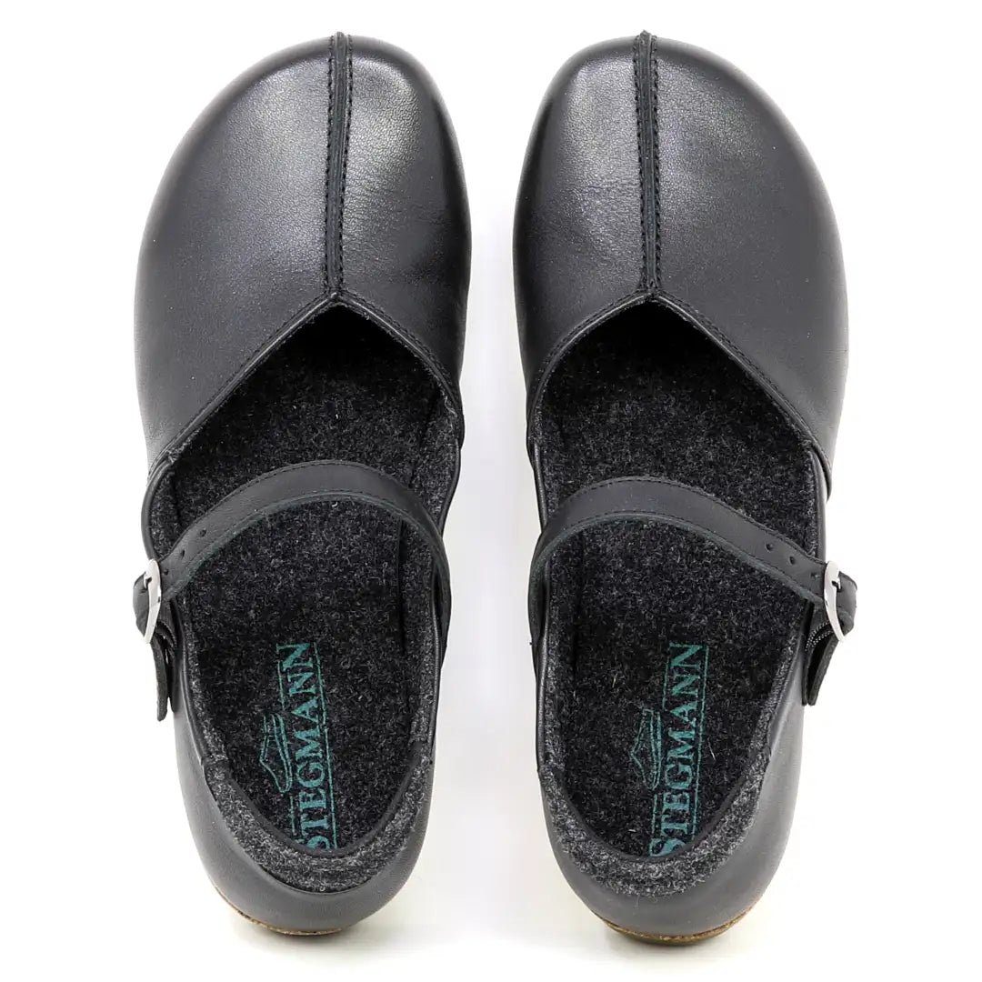 Women's Eva Leather Mary-Jane shoes, closed-toe design in vegetable tanned leather, feature side buckles and a comfortable EVA insole, shown from above on a white background.