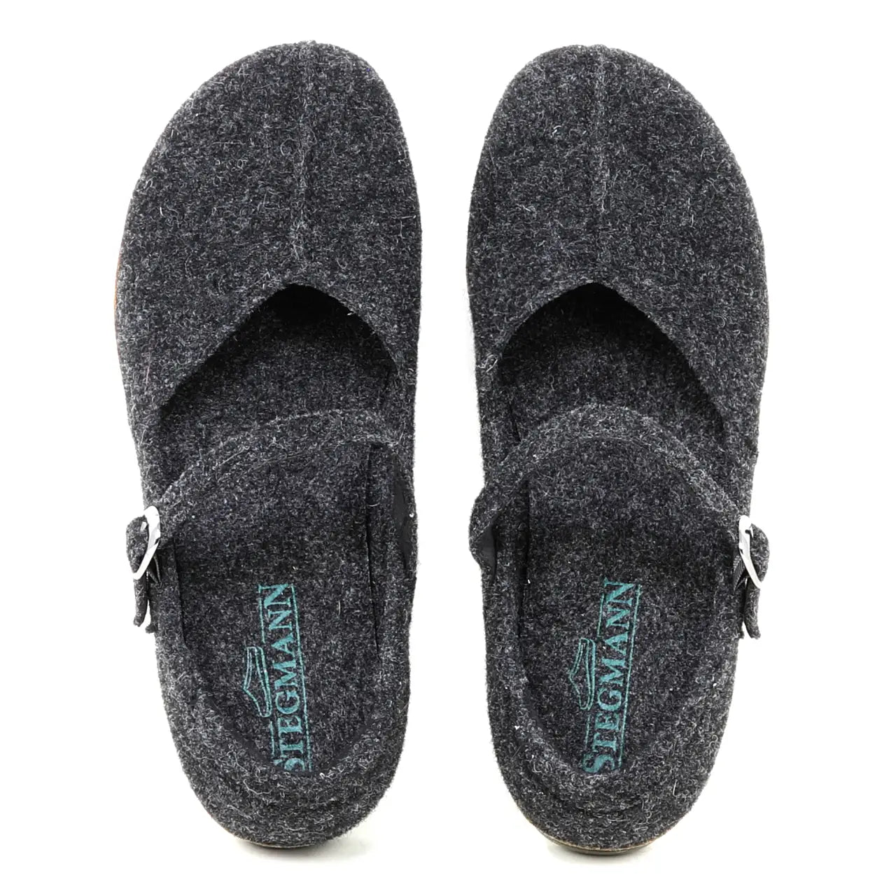 A pair of Women's Eva Wool Mary-Jane slip-on clogs in dark grey felt with buckled straps and a wide toe box for extra comfort, viewed from above. Insoles are branded "Stegmann.