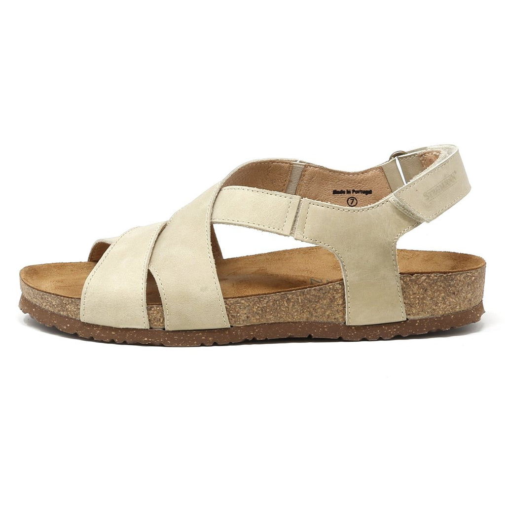 Check out the Women's Hannah Leather Sandal - Medium: a stylish beige open-toe sandal with crisscross straps, cork sole, adjustable back strap, cushioned suede footbed for comfort, textured rubber outsole for traction, and arch support.