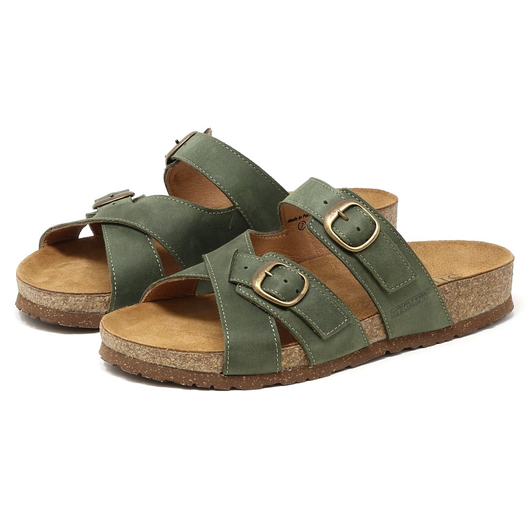 The Women's Heidi Leather Sandal - Medium boasts green leather, adjustable straps with dual buckles, a sustainable cork midsole, and a textured bottom for enhanced grip.