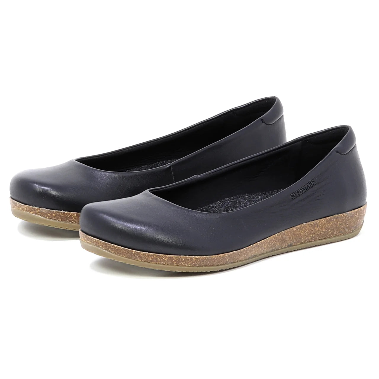 The Women's Helene Ballet Flat features a black slip-on design with rounded toes, brown cork-textured soles, and a comfortable fit, shown against a white background.