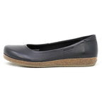 The Women's Helene Ballet Flat features black leather, a rounded toe, and a cork-textured sole, shown in side profile. It offers comfortable arch support for everyday wear.