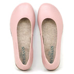 A pair of Women's Helene Stretch Leather Ballet Flats in light pink with rounded toes, viewed from above. These bunion-friendly shoes feature beige insoles with the Stegmann logo, offering stylish support and potential plantar fasciitis relief.