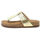 A side view of a Women's Inga Leather Sandal with a sustainable cork footbed and gold thong strap on a white background, reminiscent of the timeless Birkenstock Gizeh style.