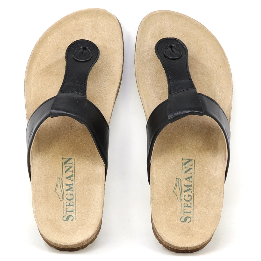A top-down view of the Women's Inga Leather Sandal in beige leather with black straps and a contoured cork footbed offering arch support.