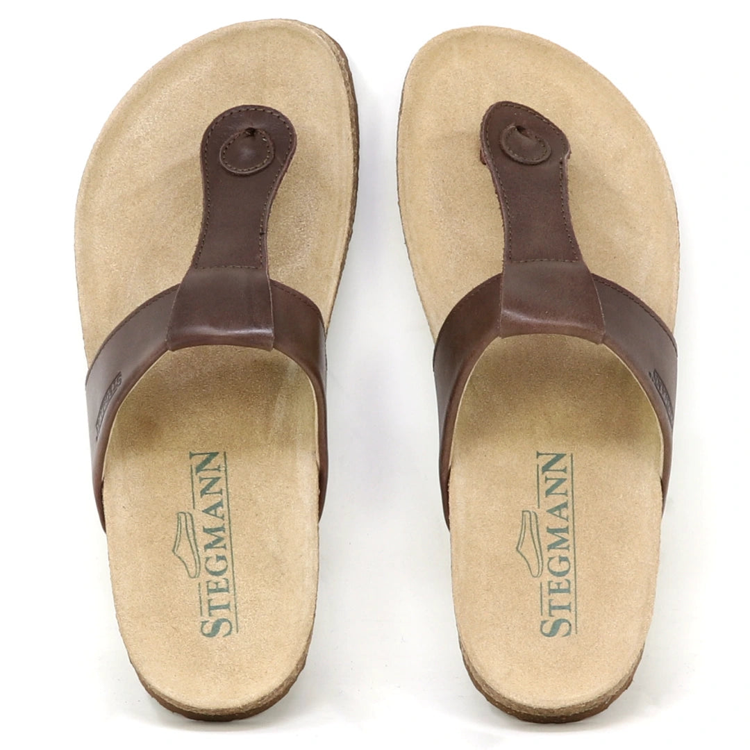A pair of Women's Inga Leather Sandals in brown leather with cork footbeds and beige suede insoles, viewed from above.