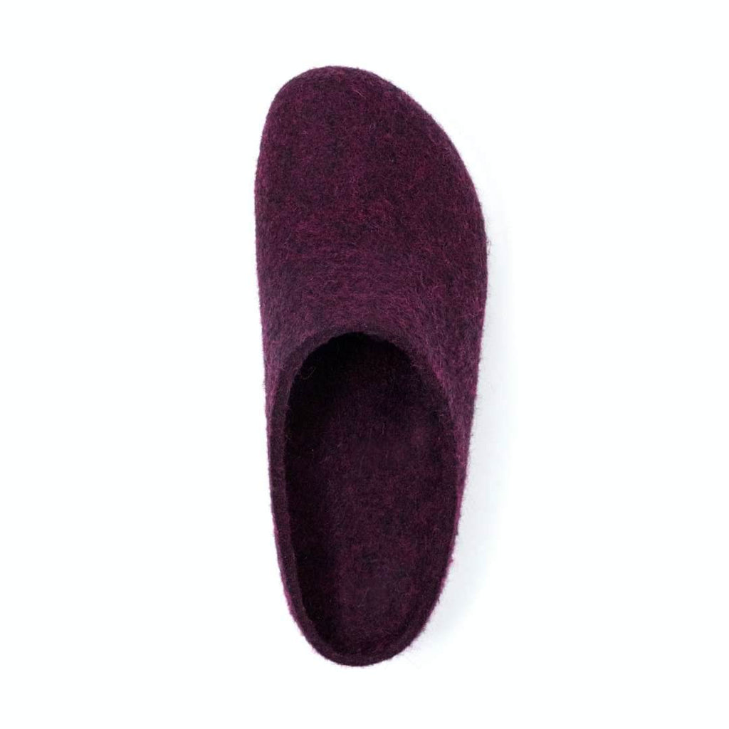 Top view of a single Women's Essenz Wool Clog in dark purple felt on a plain white background, featuring a cozy Merino wool lining for added comfort.