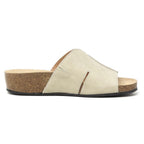Introducing the Women's Layna Leather Wedge Sandal in beige, a slip-on design with a thick sustainable cork midsole, two cut-out details on the leather upper, and a cushioned suede footbed for ultimate comfort during stylish all-day wear.