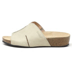 The Women's Layna Leather Wedge Sandal offers a beige slide design with a sustainable cork wedge sole, black rubber outsole, and cushioned suede footbed. The brand name is subtly embossed on the side for an elegant touch.