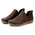 The Women's Lieben Leather Chelsea Boot features a slip-on design in brown with rounded toes, elastic side panels, wool felt lining, and textured rubber soles.