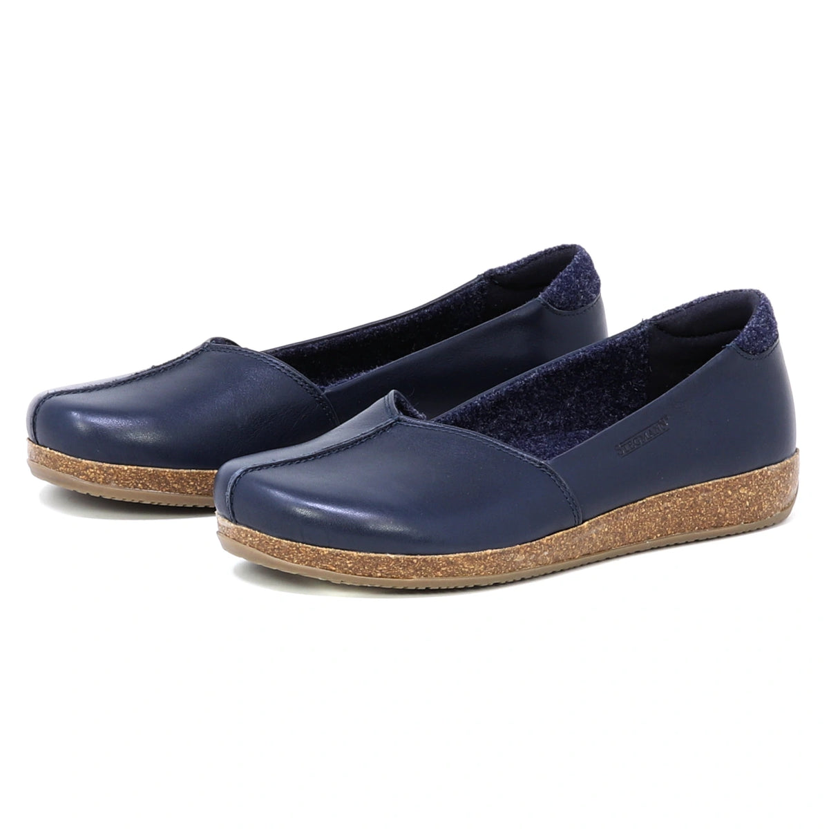 Women’s Liesl Leather Skimmer in navy blue, featuring a slip-on design with cork soles, arch support, and a wide toe box, displayed on a white background.