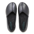 A pair of Women's Liesl Leather Skimmer slip-on shoes in black leather with a wide toe box, visible stitching, dark insoles, and "Stegmann" branding, viewed from above.