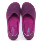 The Women's Liesl Wool Skimmer in purple felt features a wide toe box, visible stitching, and "Stegmann" insoles; this pair of women's slip-on wool shoes is shown from above.