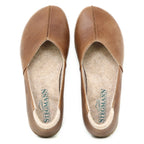 A pair of Women's Liesl Leather Skimmer shoes in brown leather with a wide toe box, rounded toes, and visible stitching, viewed from above. The insoles display the Stegmann brand logo.
