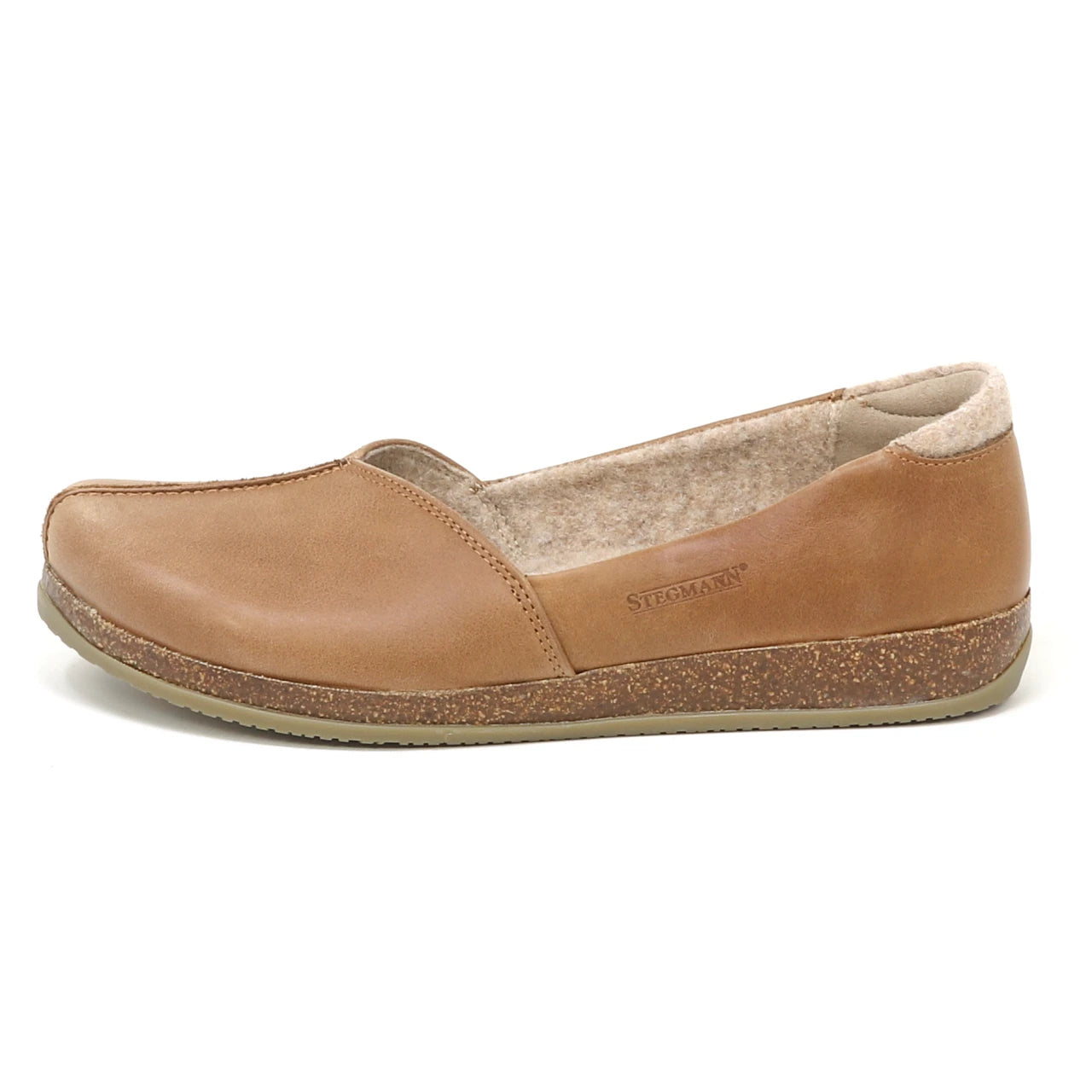 The Women's Liesl Leather Skimmer is a tan leather shoe with a wide toe box, textured rubber sole, and soft inner lining, shown from the side.