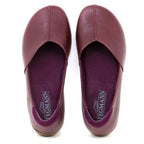 A pair of maroon Women's Liesl Leather Skimmer slip-on shoes with rounded toes and a wide toe box, shown from above on a white background.
