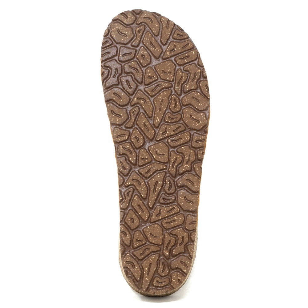 Close-up of the Women's Hannah Leather Sandal shows its brown sole with a cracked-earth-inspired textured pattern—crafted for style, arch support, and comfort featuring a soft suede footbed.