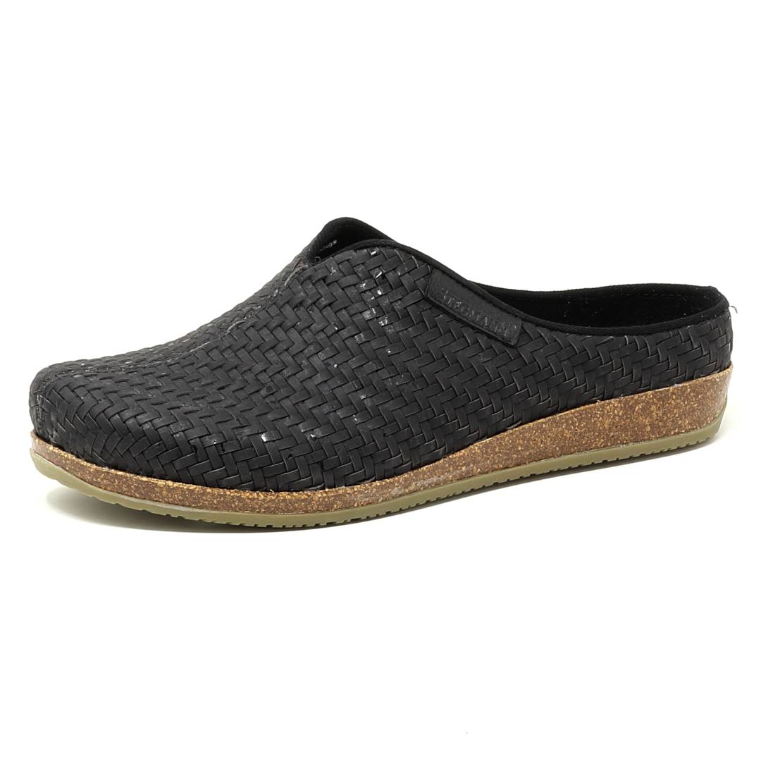 The Women's Maria Woven Cork Mule, a black slip-on shoe with a sustainable cork sole and supportive rubber bottom, is displayed against a white background.