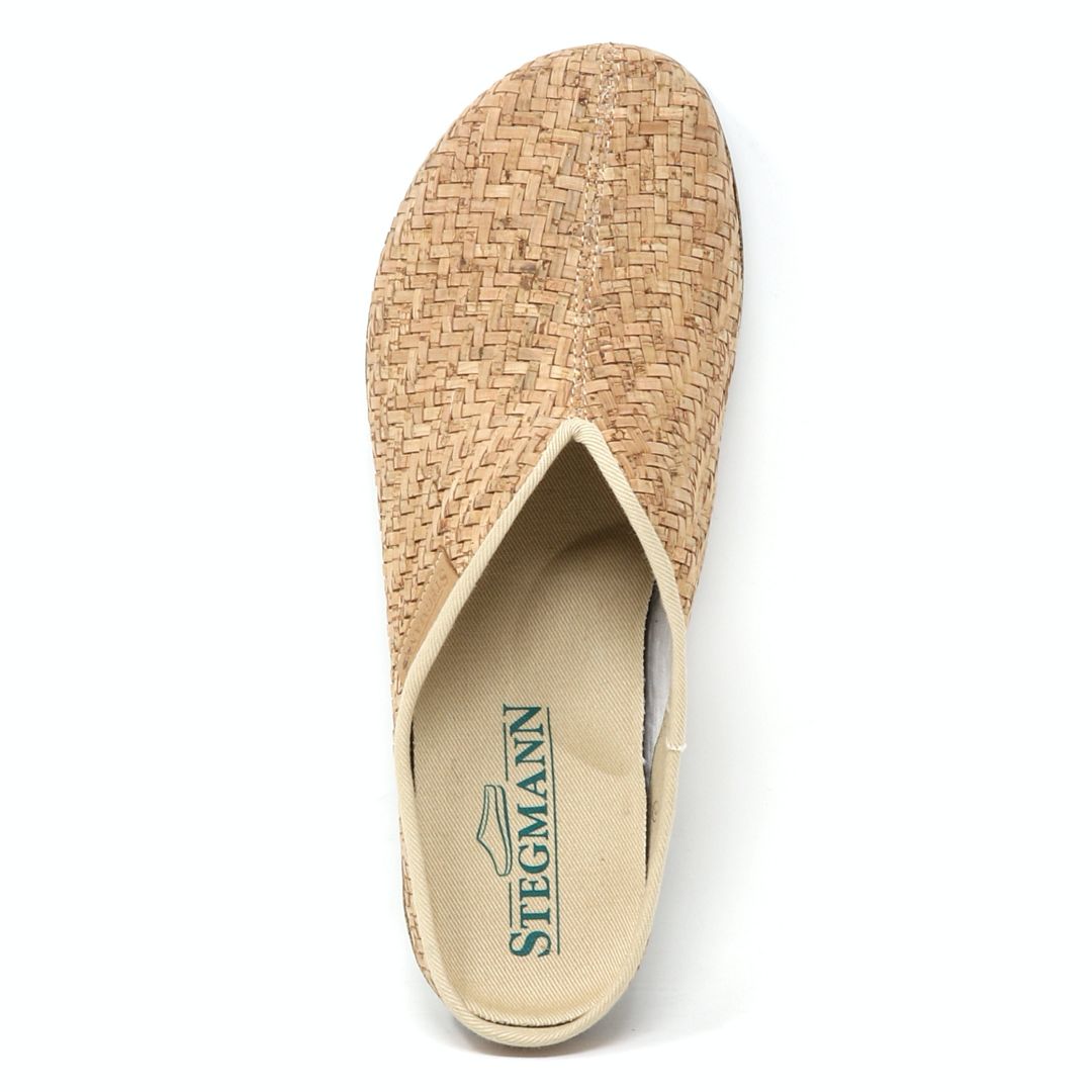 Top view of the Women's Maria Woven Cork Mule in tan, a slip-on with a sustainable cork sole, cream interior, and "Stegmann" on the insole for enhanced arch support.