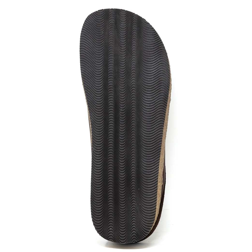 The Men's Graz Leather Clog features a wavy textured black sole with a light brown edge and a cork footbed for added comfort.