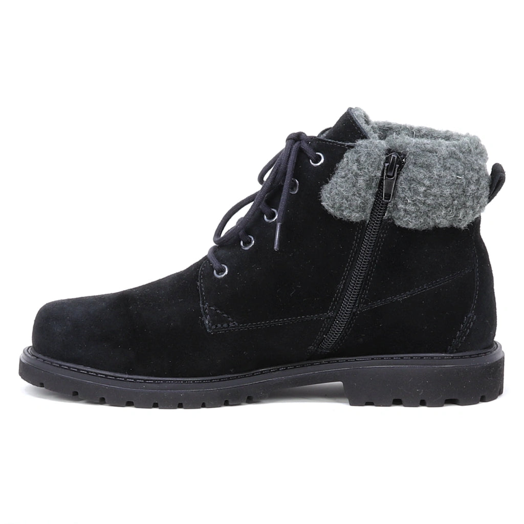 Women’s Merano Chukka Boot in black suede features a lace-up design, side zipper, and gray fleece collar, shown in profile on a white background.