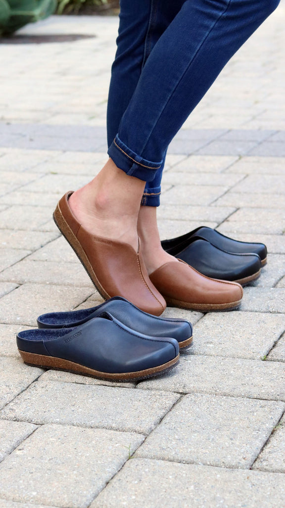 The Maria Mule in Navy, Tan and Black - This style offers unparalleled comfort, arch support and quality. One of our customer favorites, this is a shoe for spring, summer, fall and winter alike. 