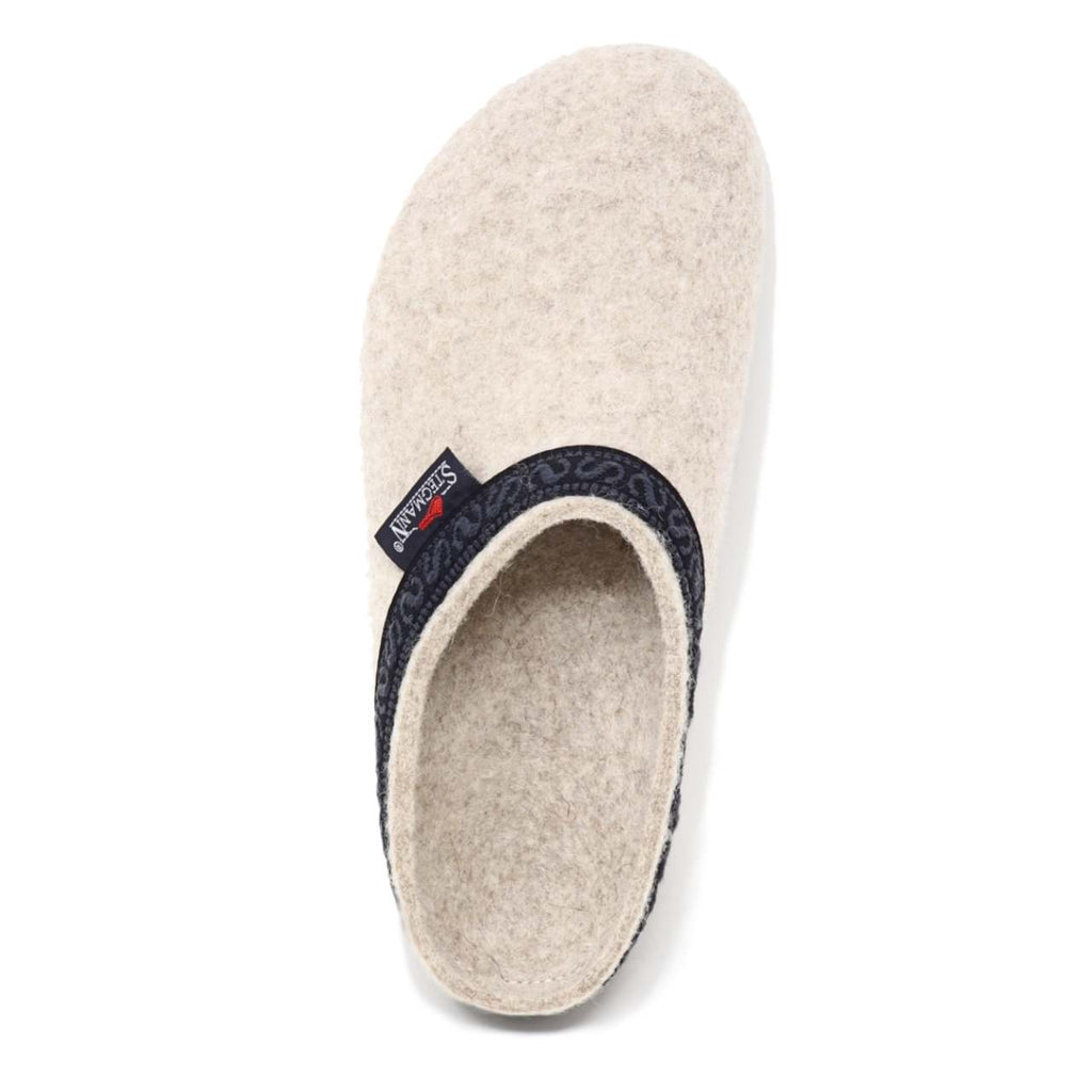 The Women's Original 108 Wool Clog - Medium features beige Merino wool felt, a black patterned trim, and a side brand tag—perfect for comfort, including for those with plantar fasciitis.