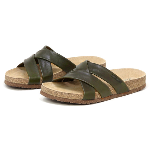 The Women's Romy Slide Sandal in green features cross-strap leather uppers, a contoured cork footbed, and textured brown outsoles, shown side by side on a white background.