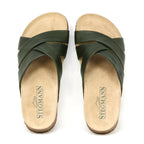 The Women's Romy Slide Sandal features olive green leather crisscross straps, a contoured cork footbed for comfort, and beige STEGMANN-branded footbeds.