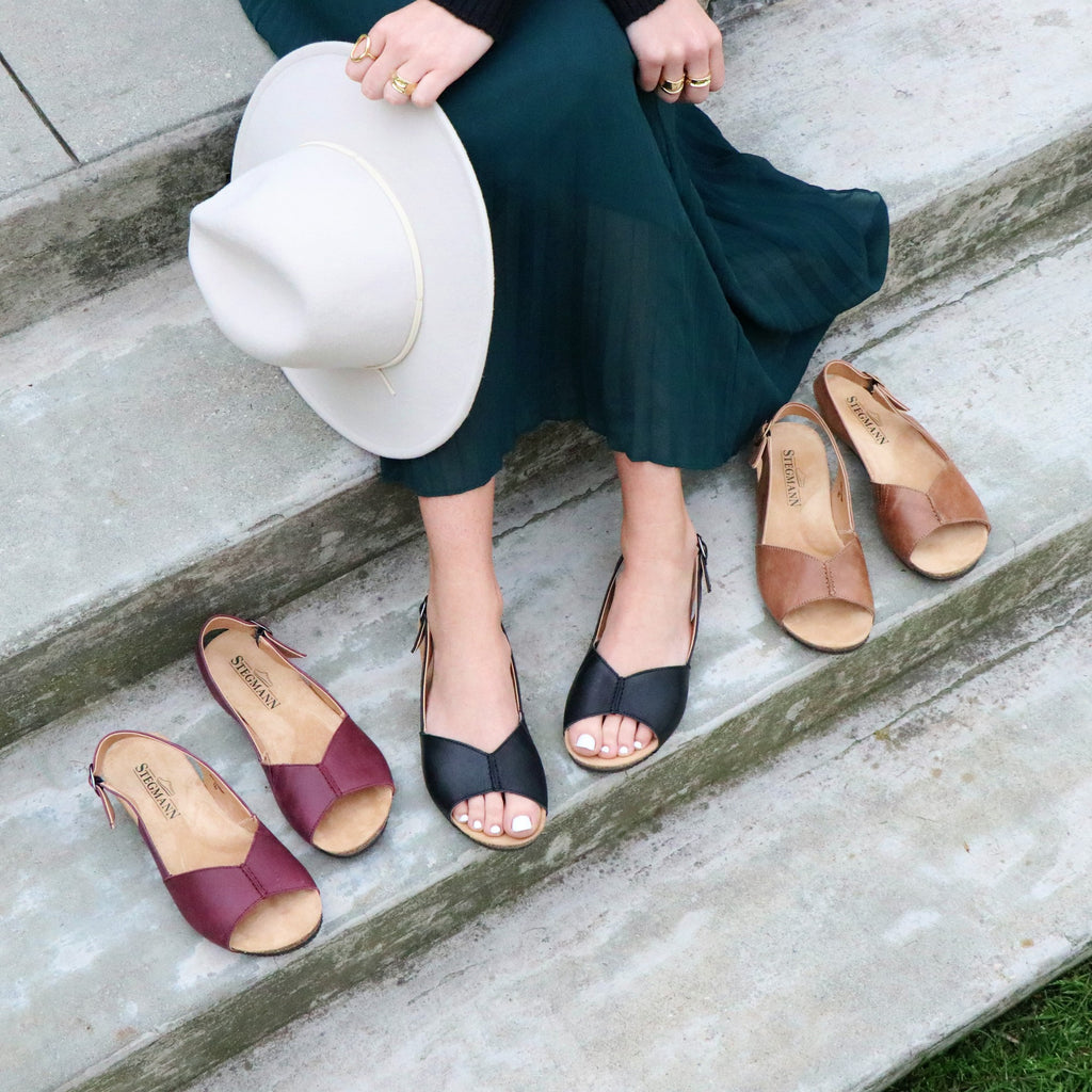 The summer ready Louisa will make your feet sing. With padded arch support, a cushioned soft suede footbed and an adjustable leather strap this cute and comfortable sandal will be your summer favorite. Wide toe box is bunion friendly. 
