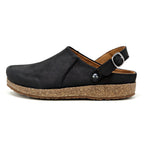 Women's Tirol Leather Clog in black leather showcases a wide toe box and cork sole, with an adjustable back strap for comfort, side view.