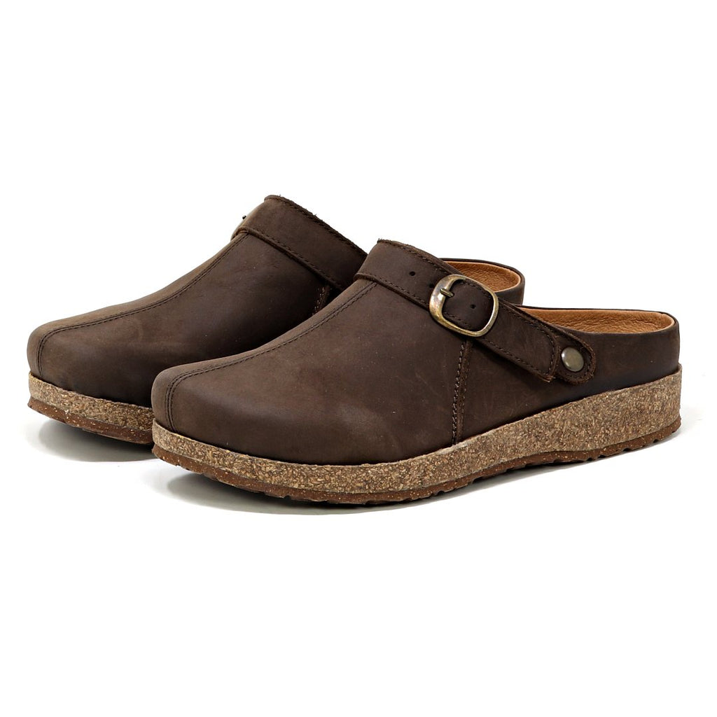 A pair of Women's Tirol Leather Clogs in brown oiled leather, featuring adjustable straps and cork soles, viewed from an angle.