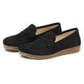 The Women's Victoria Loafer offers black slip-on design with cork-textured soles, nubuck finish for sophistication, and a shock-absorbing midsole for ultimate comfort.