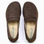A pair of brown suede Women's Victoria Loafers with stitching details, a branded "Stegmann" insole, and arch support for all-day comfort.